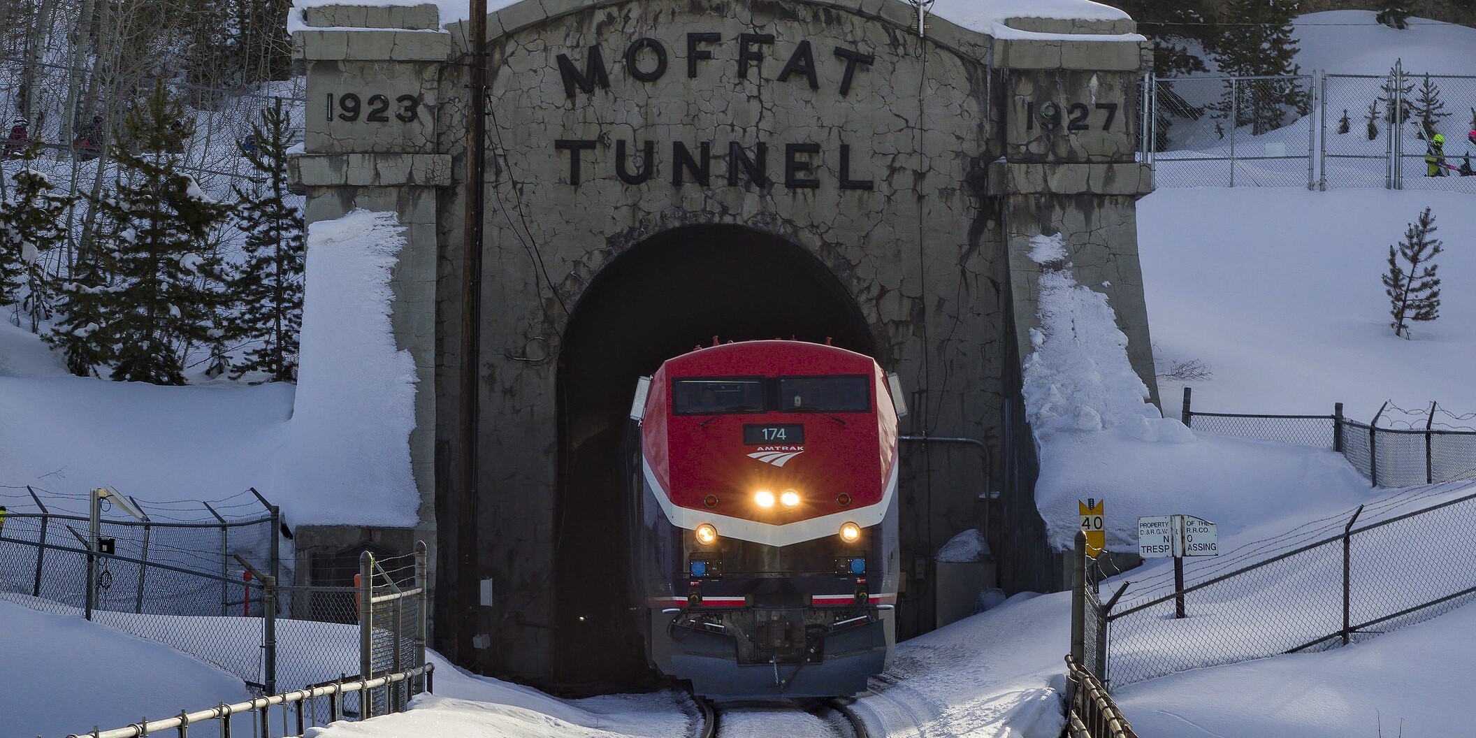 The Winter Park Express emerges from the Moffat Tunnel at Winter Park Resort.